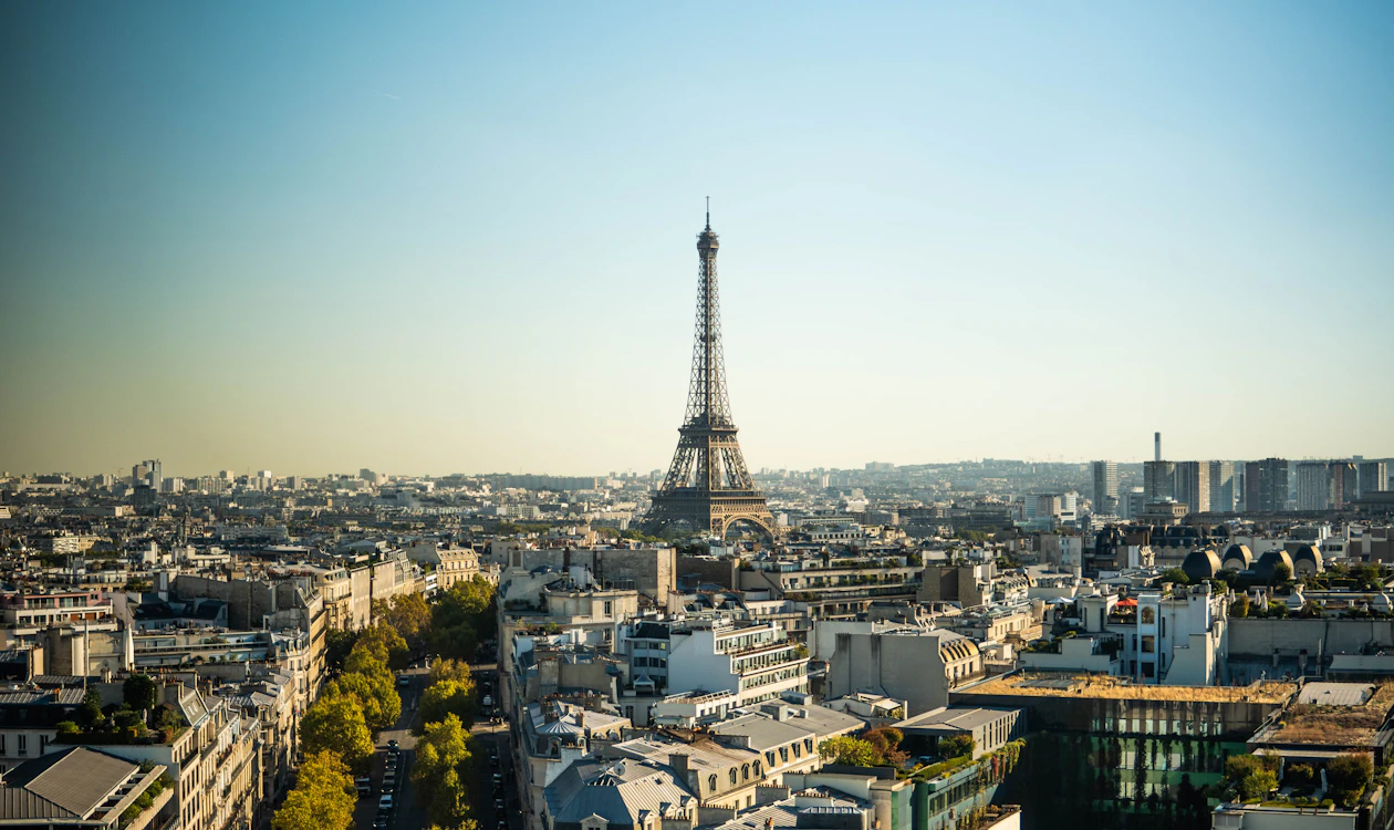 The Eiffel Tower above the rooftops of Paris
